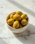 Bowl of large green olives