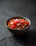 Kachumber salad of onion, tomato and cucumber