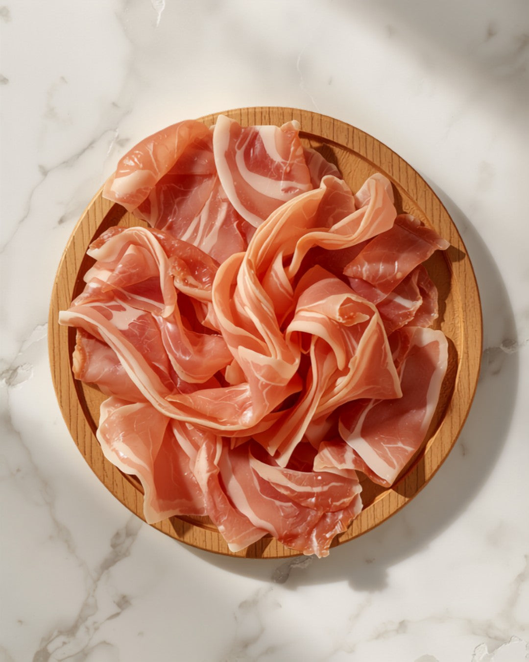 Parma ham slices on a board