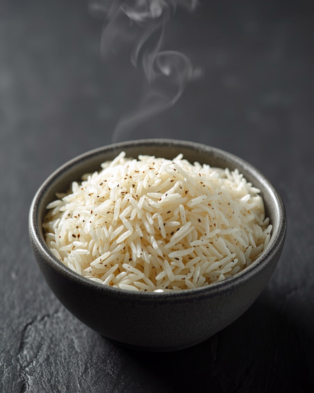 Fluffy long-grain basmati rice in a stoneware bowl