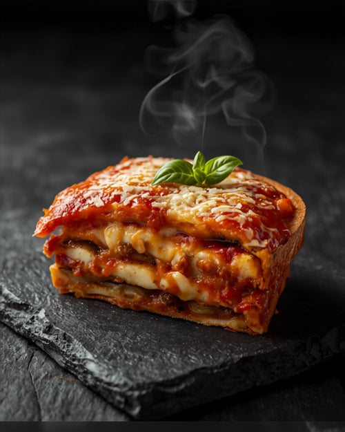 Aubergine parmigiana cut portion showing layers