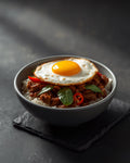 Beef Pad Kra Pao with jasmine rice and fried egg